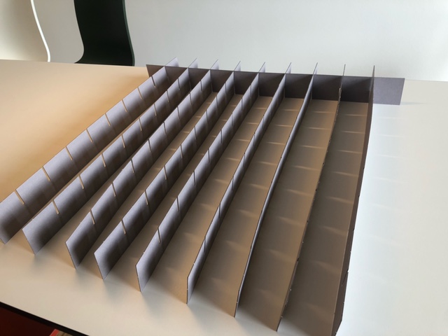 Strips for artifact storage grid